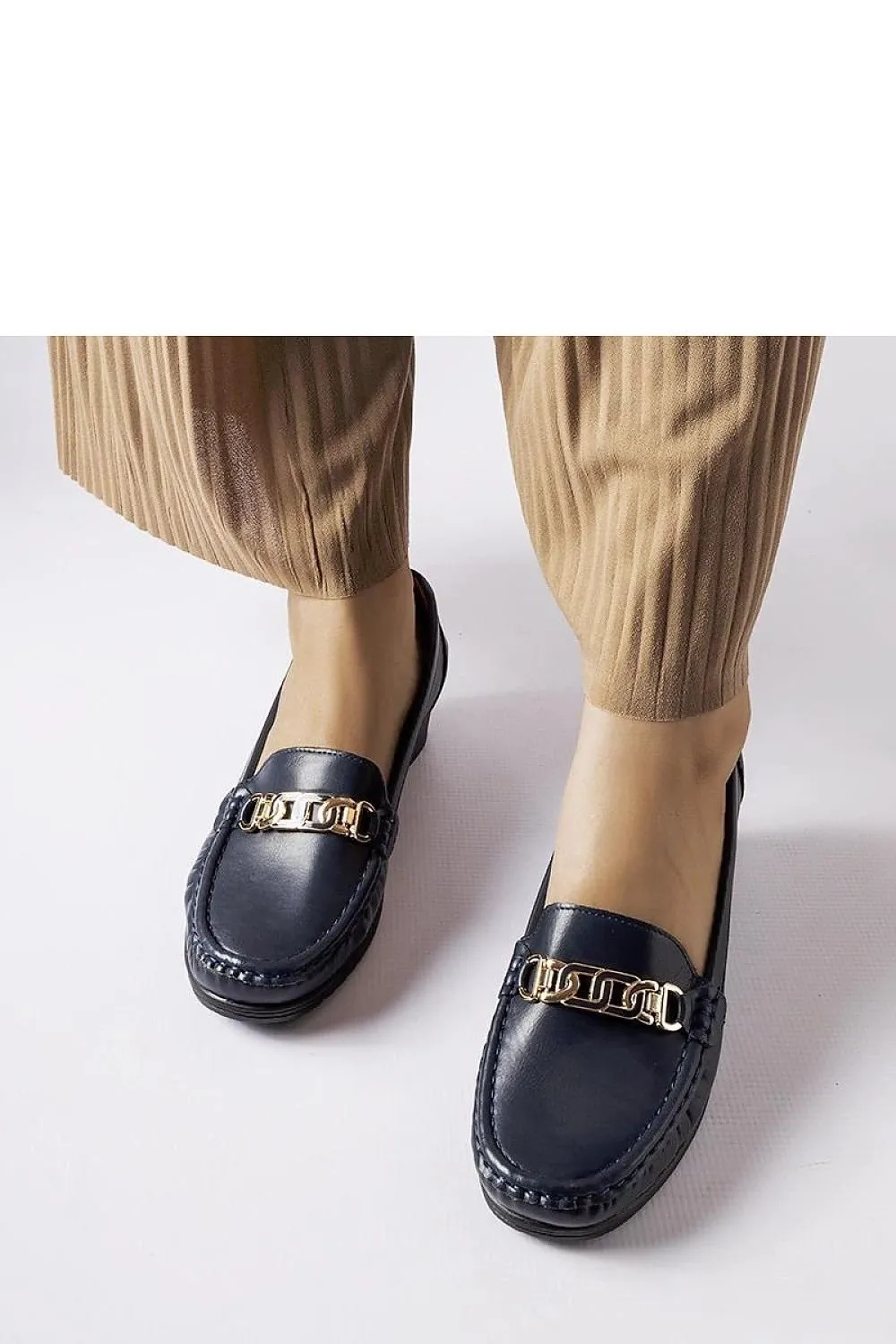 Brown moccasins with a buckle