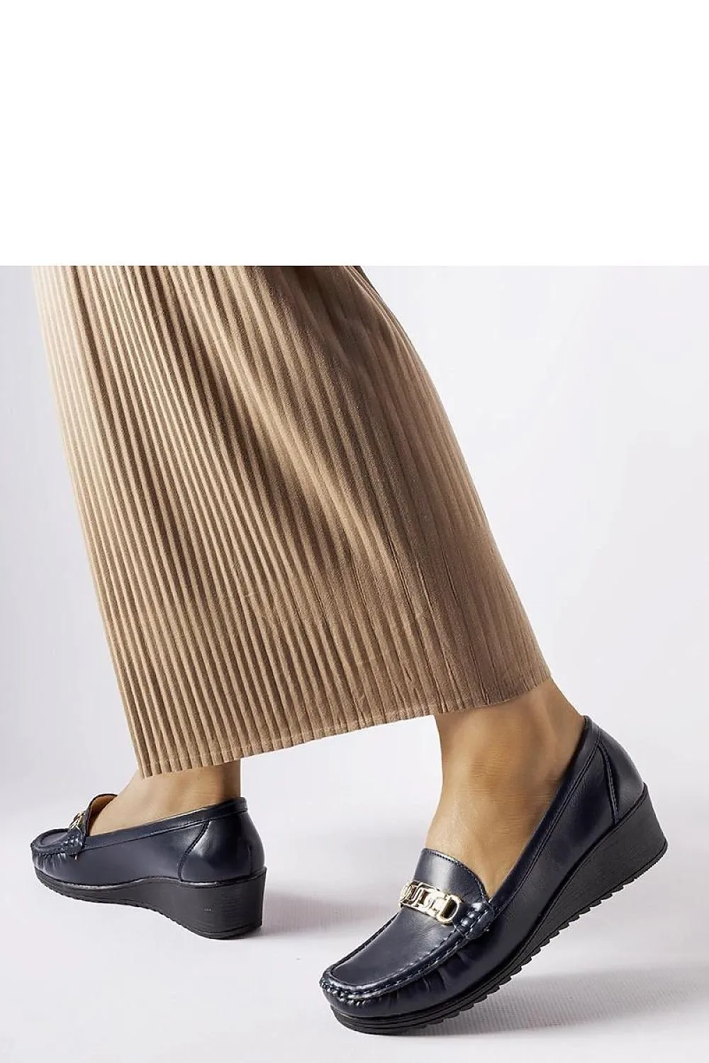 Brown moccasins with a buckle