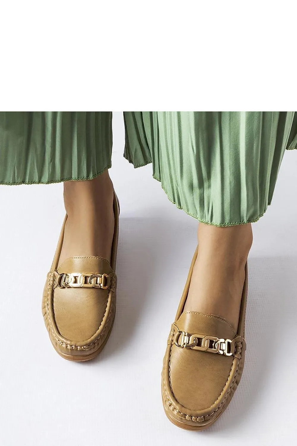 Brown moccasins with a buckle