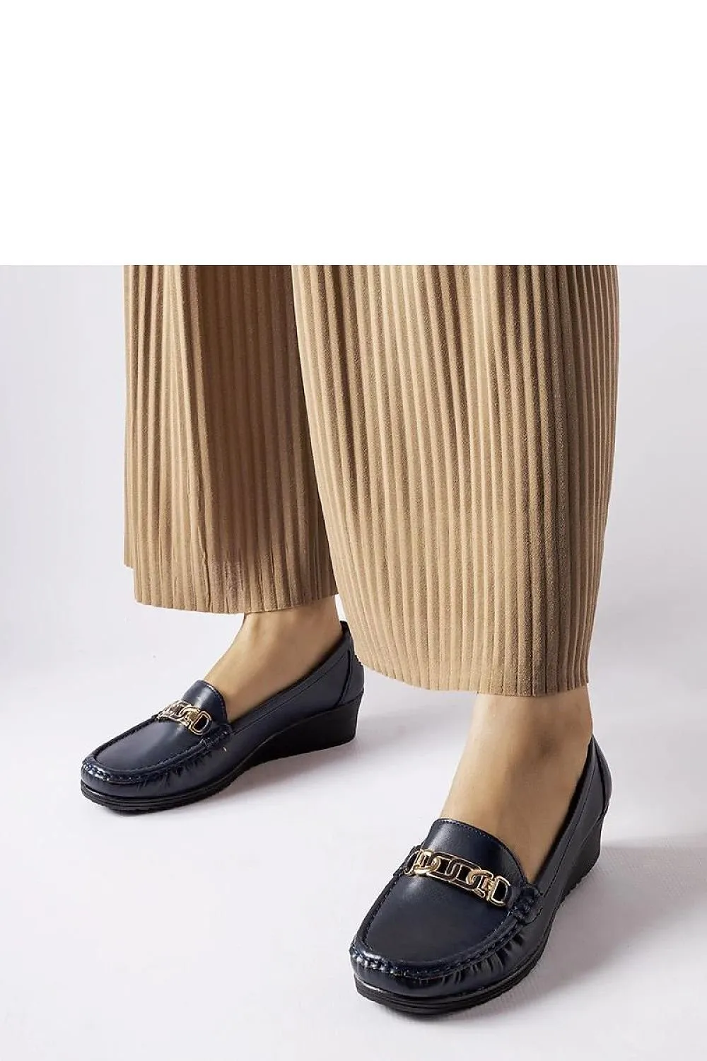 Brown moccasins with a buckle